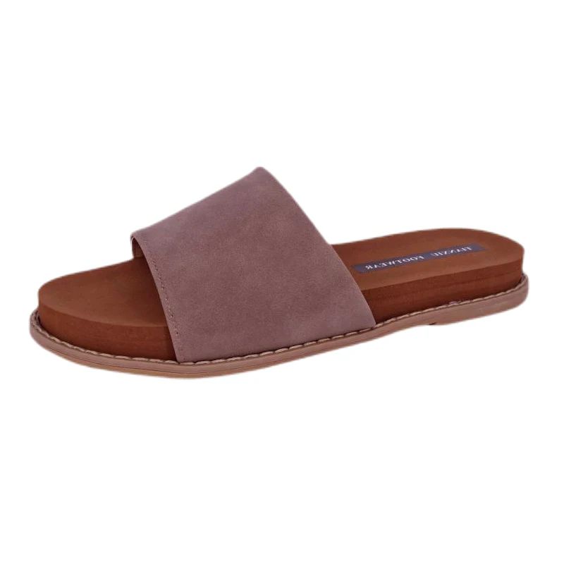 ما الذي يجعل الصنادل المسطحة الحديثة خيار الأحذية الأكثر عملية اليوم؟